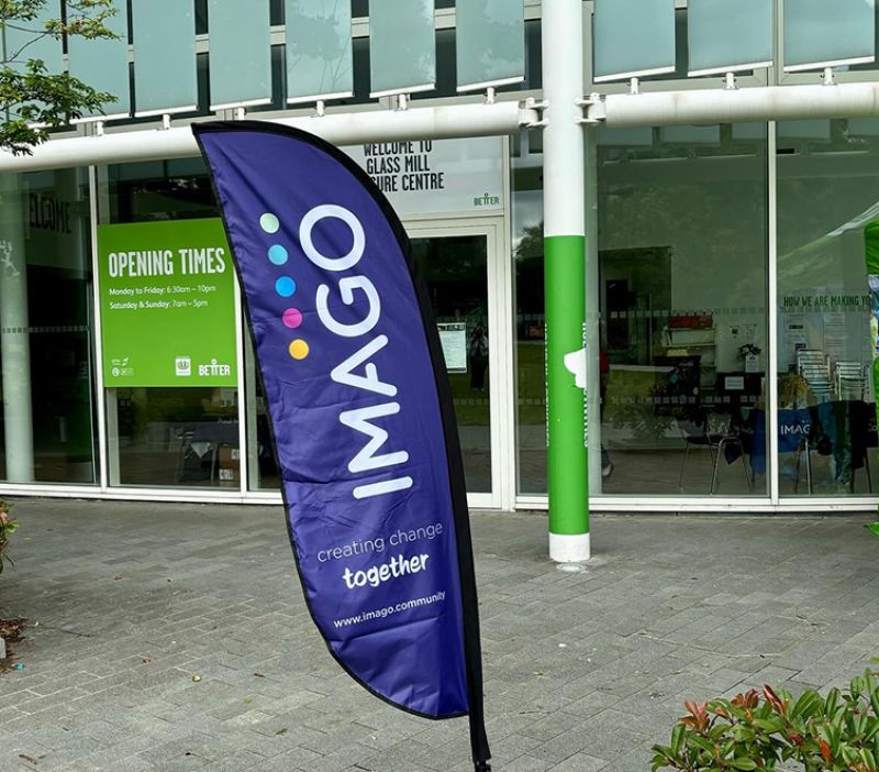an Imago flag standing outside glass mill leisure  centre in lewisham